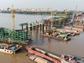 Cầu Trần Hưng Đạo đạt tiến độ “thần tốc”, thành công vượt lũ, trụ cầu vươn cao, dựng vòm thép chỉ sau 8 tháng khởi công