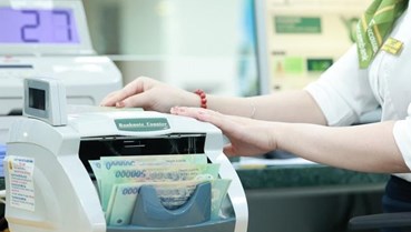 Tín dụng tăng tốc,cuộc đua huy động vốn nóng trở lại