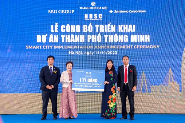 L&atilde;nh đạo C&ocirc;ng ty Th&agrave;nh phố Th&ocirc;ng minh Bắc H&agrave; Nội trao ủng hộ 1 tỷ đồng x&acirc;y dựng 20 căn nh&agrave; đại đo&agrave;n kết tại huyện Đ&ocirc;ng Anh. &nbsp;