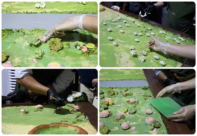 Nhờ đôi tay tài hoa của các đầu bếp mà từng chi tiết của mô hình được chăm chút cẩn thận và khéo léo trang trí lên mô hình (Ảnh: VietKings)