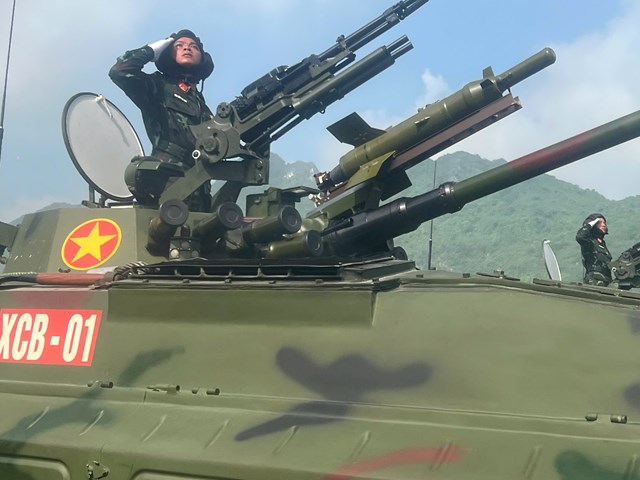 Bức tranh thời đại hào hùng: Từ bước chân người lính đến sức mạnh và niềm tin quốc gia - Ảnh 4